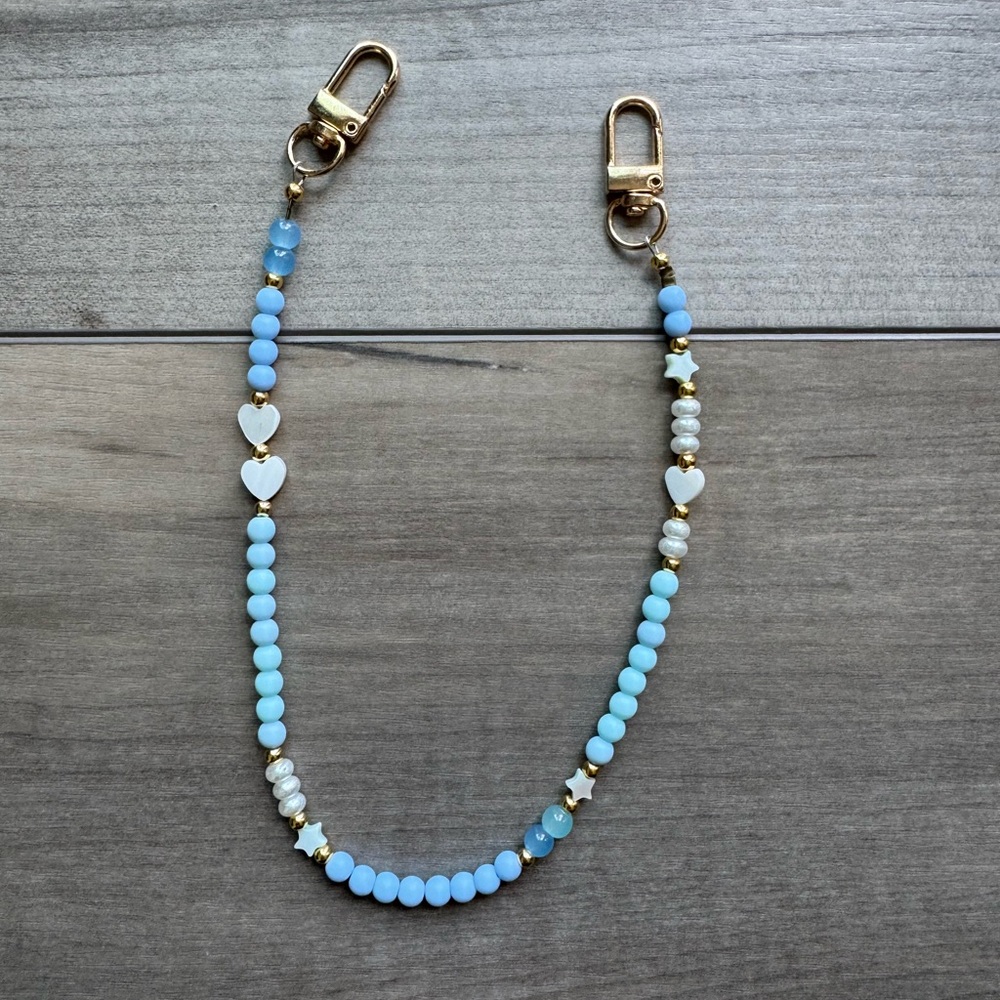 Blue and Gold Phone Strap with Elegant Design